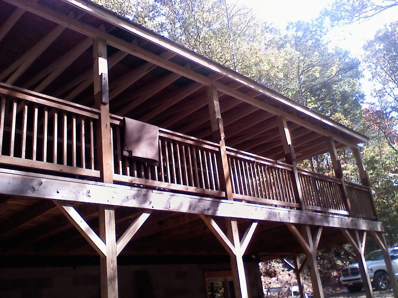 Timber framing under a new elevated porch and deck — Roof Leak Repair in Chesapeake by Roofing Brothers
